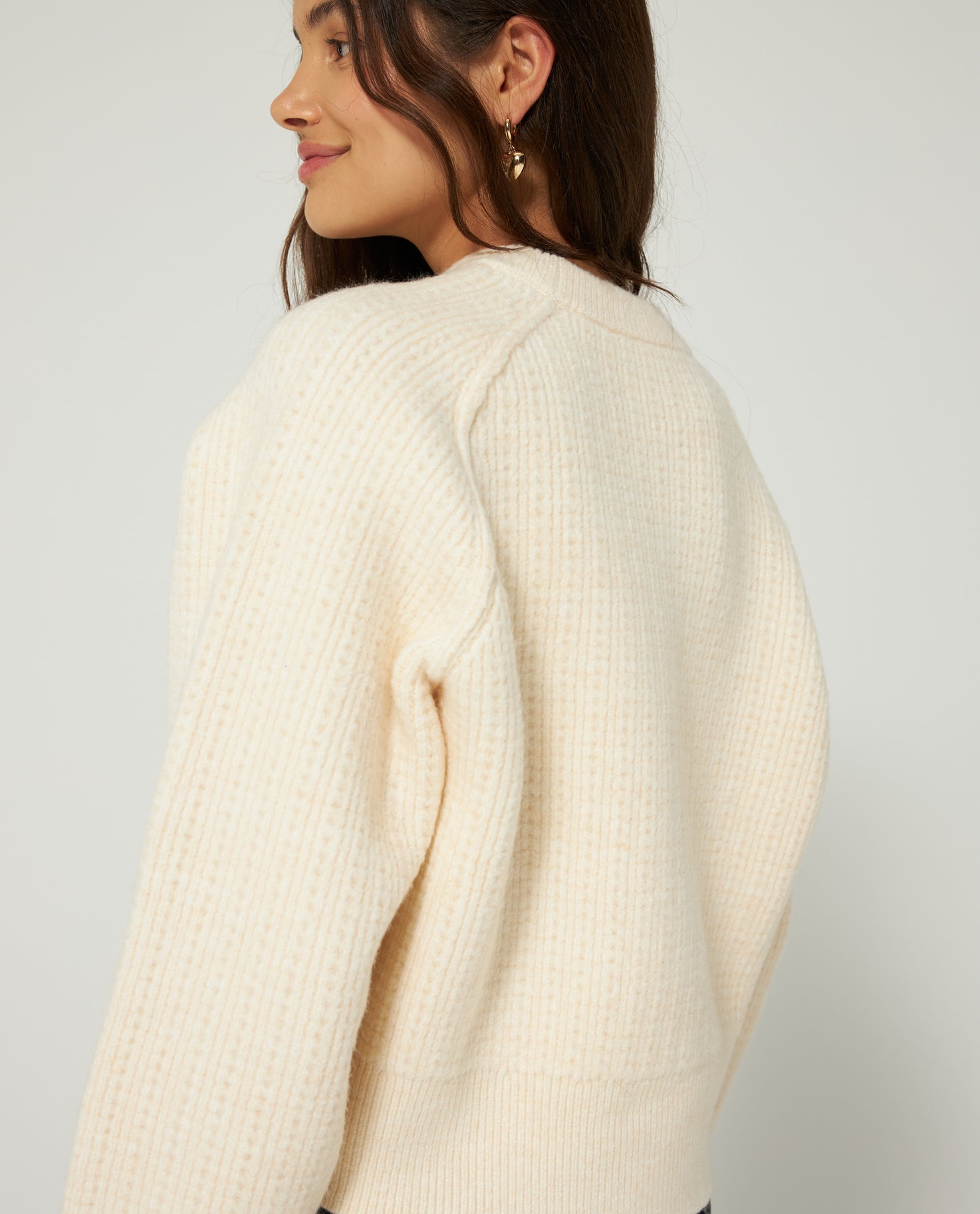 ASYMMETRIC CABLE KNIT PULLOVER